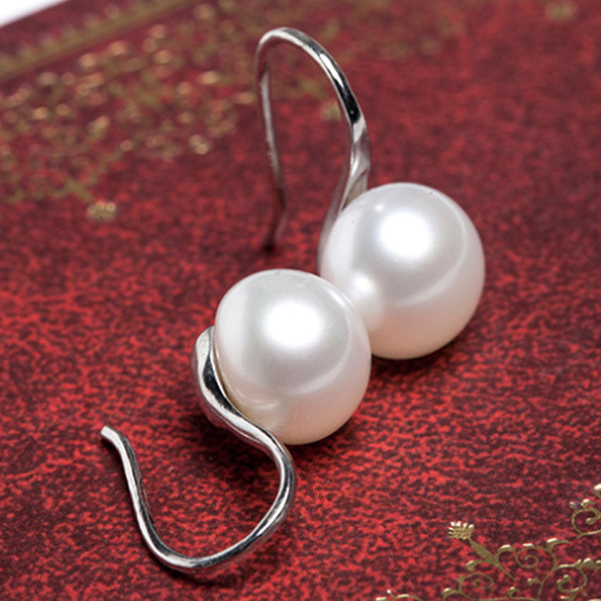 Korean Version Of Fashion Sun Pearl Earrings