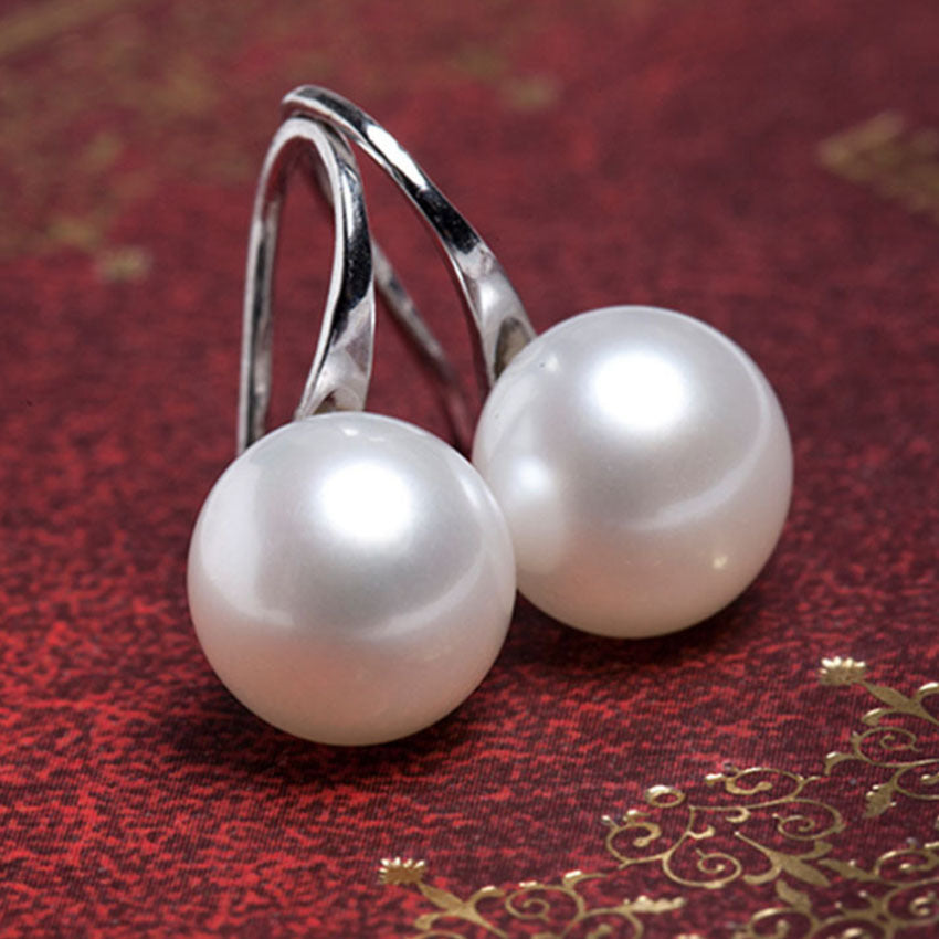 Korean Version Of Fashion Sun Pearl Earrings